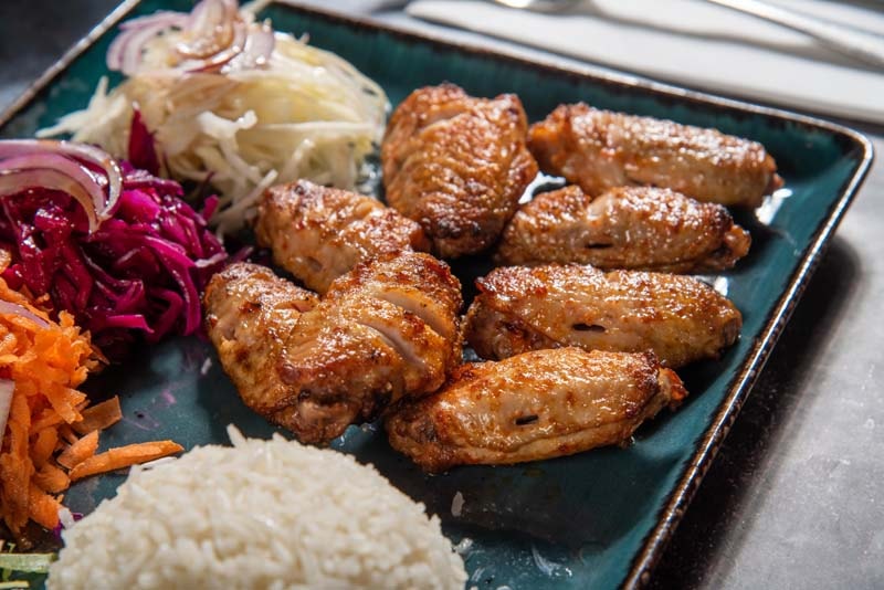 Grilled chicken wings close-up